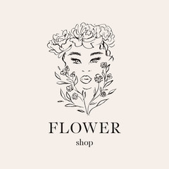 Logo flower shop. Girl's face in flowers.