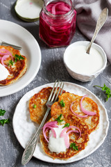 Breakfast made from traditional boxty fritters or latkes served with pickled onions and sour cream.