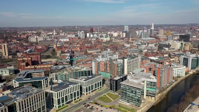 Aerial photo of the British town of Leeds in West Yorkshire UK, showing the Leeds City Centre taken with with a drone on a bright sunny day in the town of Holbeck near to the centre.
