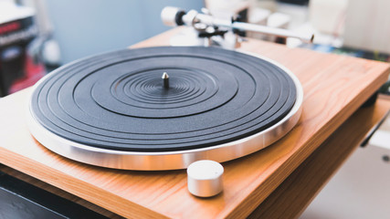 Close-up of modern turntable vinyl record player. Needle of a vinyl record