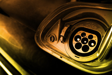 Electric vehicle (EV) car charging socket cap. It was opened  to prepare the electric charger for...