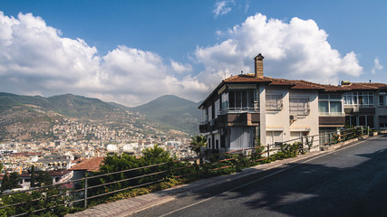 Houses on the background of Alanya, a descent from the mountain