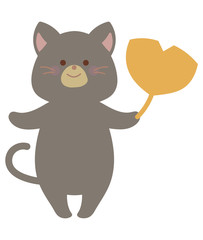 紅葉したイチョウとネコ