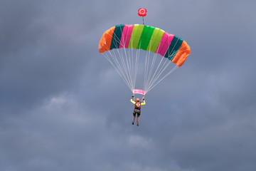 A parachute is flying in the sky.