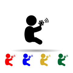 Child plays with a rattle multi color icon. Simple glyph, flat vector of toddler development icons for ui and ux, website or mobile application