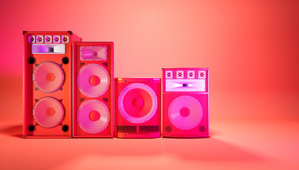 red speaker system on a red background in purple lighting