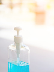 Antiseptic hand gel or alcohol gel prevent the spread of germs and bacteria and avoid infections corona virus,covid-19 prevention for serving customers in the gas station.