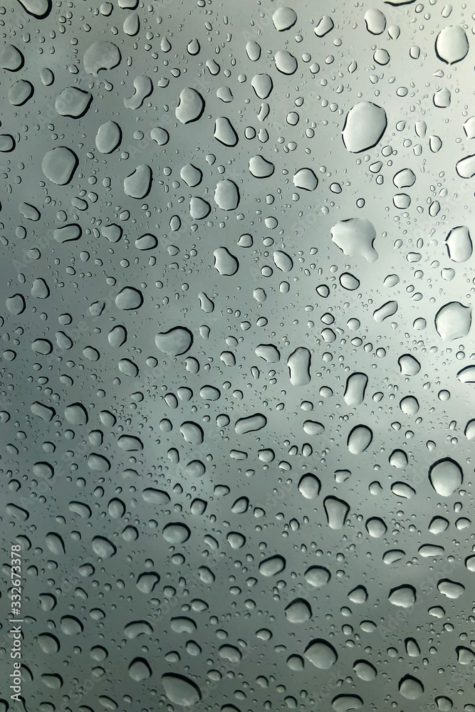 Poster water drop on the clear glass. fogged misted window with rain drops. abstract background.
