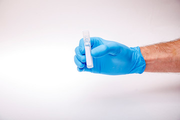 Corona Virus in Lab. Scientist hold in hand Test or vaccine. New Epidemic Coronavirus 2019 nCoV or Covid 19 concept.