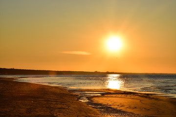 Fototapeta na wymiar Gold tone sunset at the Baltic Sea