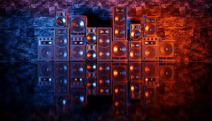 speaker system on a black background in blue and orange lighting