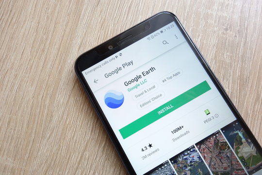 KONSKIE, POLAND - JUNE 24, 2018: Google Earth app on Google Play Store website displayed on Huawei Y6 2018 smartphone