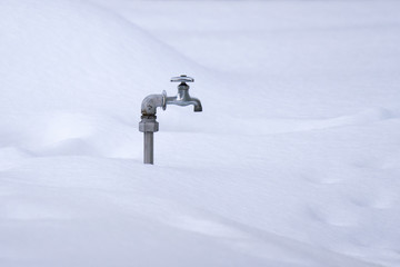 Water tap on snow in japan