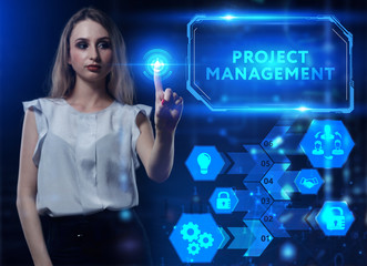 Business, Technology, Internet and network concept. Young businessman working on a virtual screen of the future and sees the inscription: Project management