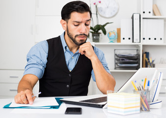 Man employee is indignant because he is having issues with project