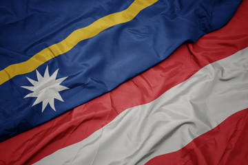 waving colorful flag of austria and national flag of Nauru .