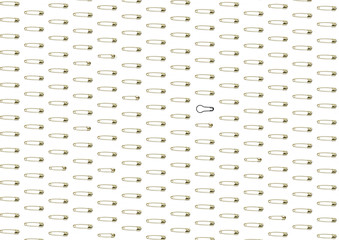 Safety pin pattern isolated on white