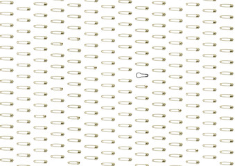 Safety pin pattern isolated on white