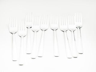 Set of forks over white background