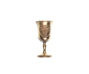 golden royal wineglass isolated on white background