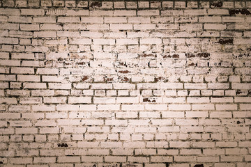 Obraz premium toned colored red brick wall textured background