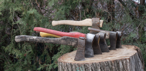 axes stuck in a stump