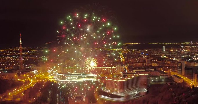 fireworks over the city shot with quadrocopter. the day of the city. holiday