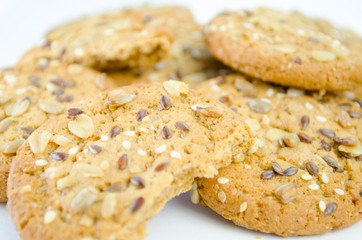 Cereal cookies with seeds and nuts close up. Healthy food, gluten free diet
