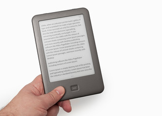 Holding E-book reader in hand