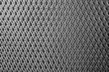 Black and white abstract background of dark metal wired texture.