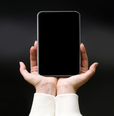 Woman hands holding the smartphone