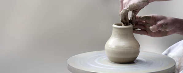 Foto op Plexiglas  hands making ceramic cup © AlenKadr