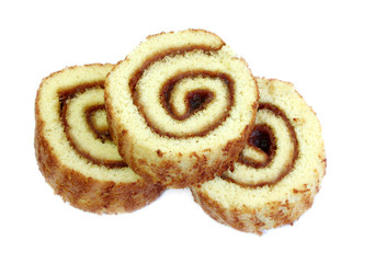 Swiss sweet roll with jam isolated, slices of homemade sponge roll cake isolated