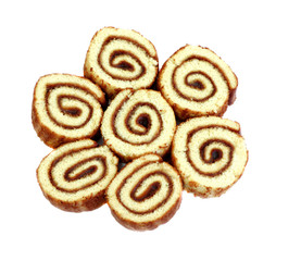 Swiss sweet roll with jam isolated, slices of homemade sponge roll cake isolated