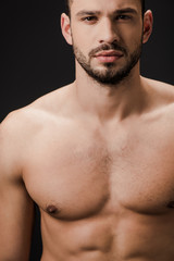 handsome sexy naked man isolated on black