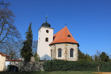 Fototapeta na wymiar The oldest church in Central Europe in Bohemia, with an endless blue sky, without clouds