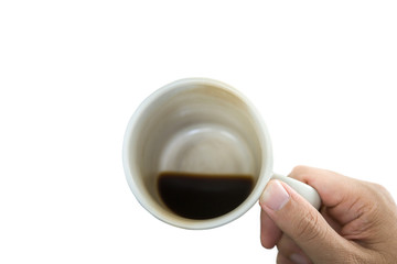 The hand of a person holding a cup of coffee. Isolated on white background.