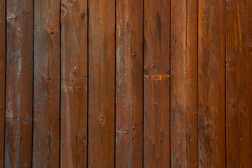Plain wooden background  illuminated by sunlight