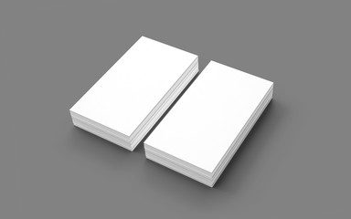 Blank business cards isolated on grey.