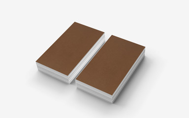 Blank cardboard business cards isolated on white template to showcase your design, logo, embossing etc.
