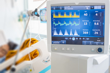 Fototapeta premium Ventilator monitor ,given oxygen by intubation tube to patient, setting in ICU/Emergency room
