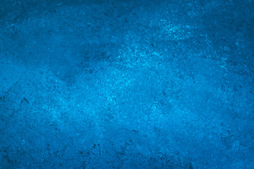 Dark blue painted wall, canvas. Blots on grunge paper backgrounds. Abstract pattern of watercolor. Creative artistic backdrop. Template with gradient, texture.