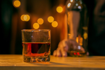 Barman pouring whiskey whiskey glass beautiful night