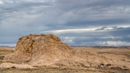 Fototapeta na wymiar dark stormy clouds over prairie