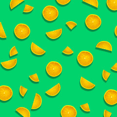 Colorful fruit pattern of orange slices on colorful background. Top view. Flat lay