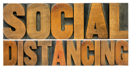 social distancing word abstract in wood type