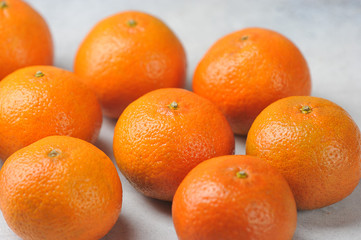 tangerines on a gray background