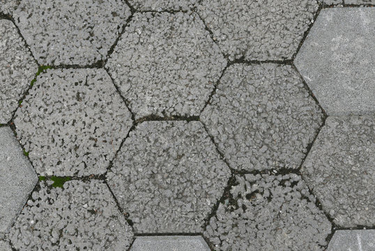 Top View Of Gray Interlocking Paving Stone Driveway.