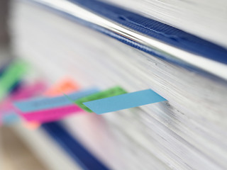 Close up color stickers between documents folder