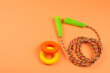 Fototapeta premium Sport equipment on orange background.